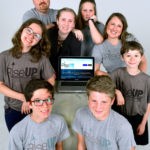 Staff Photo by Robin Rudd / Sandy Pricer and her husband, Joe, have biological and adopted former fosters who are teens, and recently started a nonprofit, RiseUp, to help equip other teens with life and leadership skills.  From left front, Jake and Blake, from left back, Izzy, Joe, Katie, Ally Sandy and Nate.